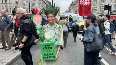 Numerous Activists Converge in Downtown London to Challenge President Trump's Return Diplomatic Journey